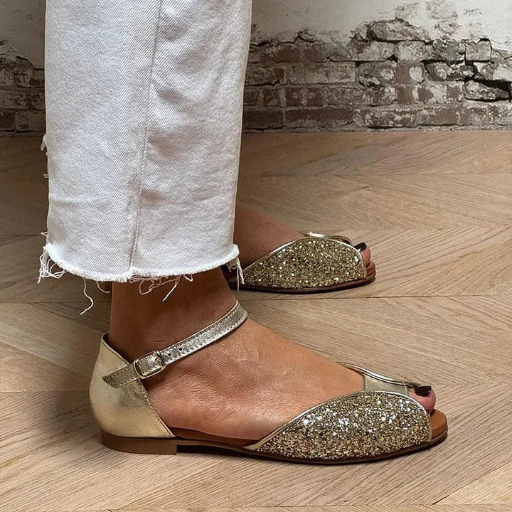 FLAT SANDAL WITH ANKLE STRAP