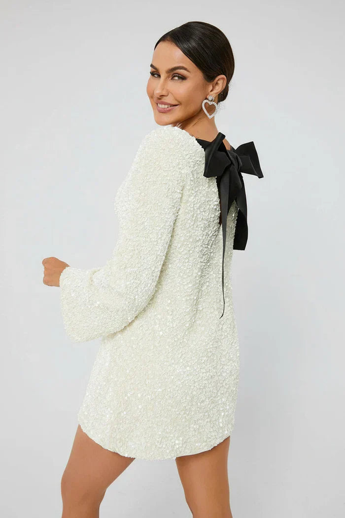 Clara - Sequin dress with a bow at the back