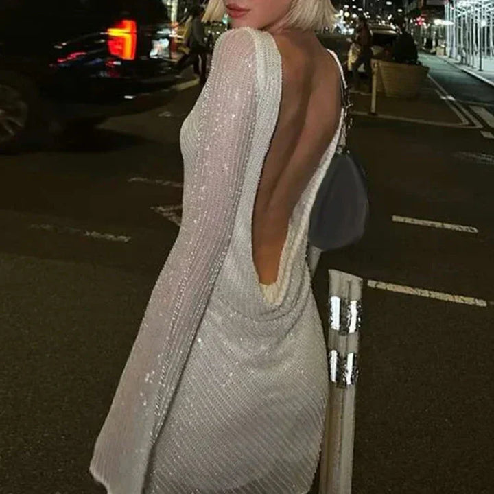 Zerynna™ | Backless shimmering long-sleeved mini dress
