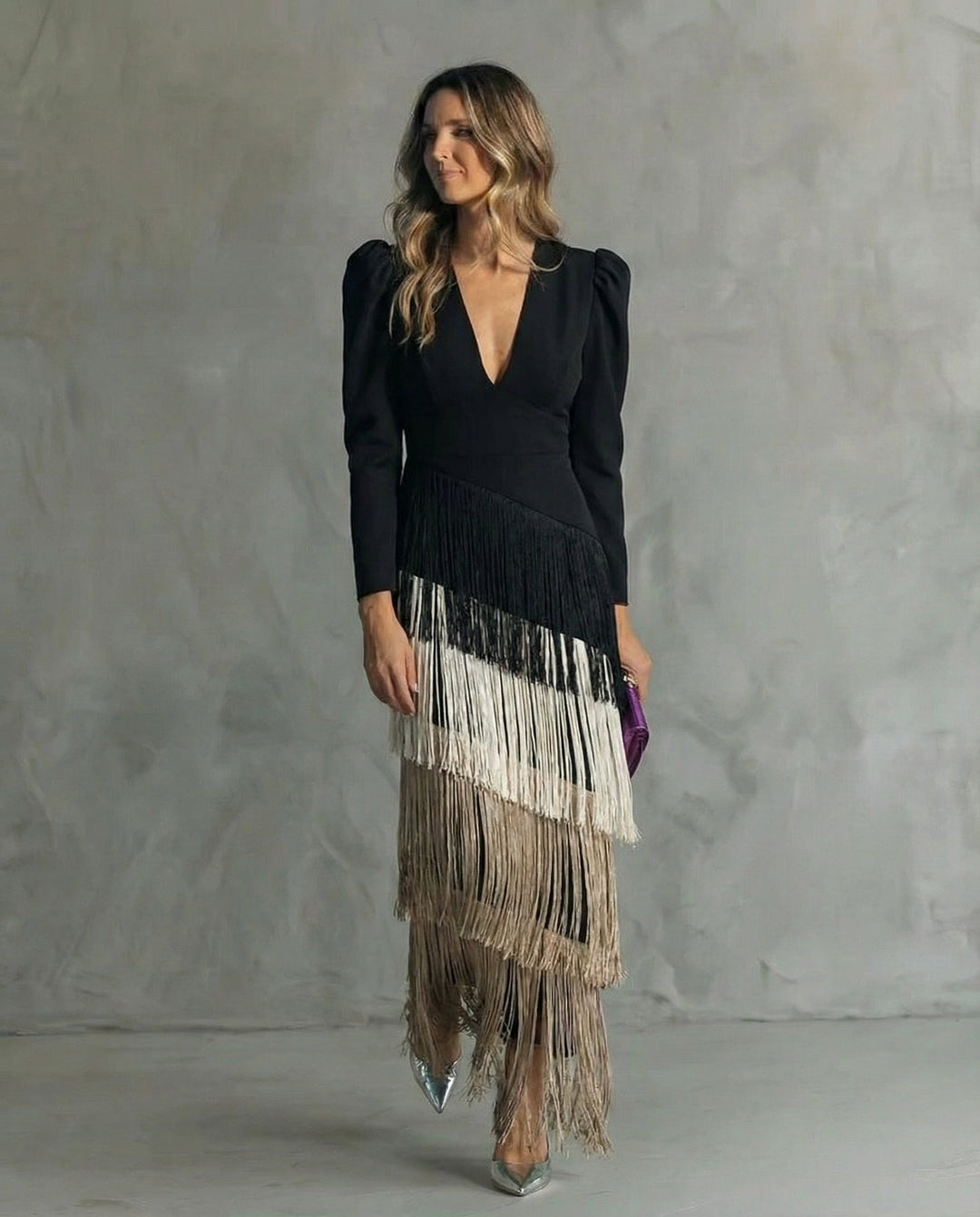 Clara  | Elegante vestido midi con mangas de flecos